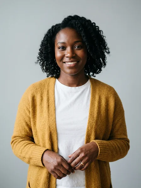 Original AI-created adult partner portrait: a woman in a mustard cardigan